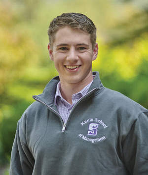 Headshot of smiling student wearing a University of Scranton pullover