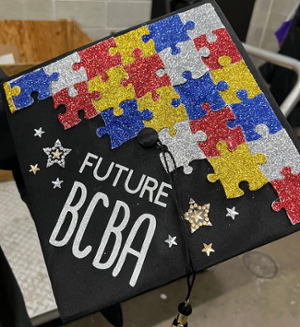 Graduation cap with "Future BCBA" -- meaning future board-certified behavior analyst -- written on the top.