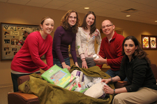 Current University of Scranton students (from left) Tara Gramigna of Scranton, Mary Zorechak of Peckville and Mary Elise Lynch of Philadelphia helped Scranton alumni Christopher Jones, M.D. (second from right) and Pamela Taffera, D.O. (right) pack before the two physicians headed to Haiti in January. Dr. Jones and Dr. Taffera traveled to the Caribbean country as part of The University's annual Alumni Medical Council mission trip to Haiti.