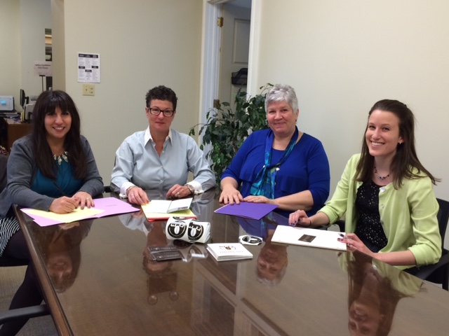 Representatives from The University of Scranton’s Women’s Entrepreneurship Center and SBDC meet with Mary Tellie, founder of Electric City Roasting Co., to plan for the upcoming “Coffee and Confidence,” a free information session on April 17 for women with lower incomes interested in learning about self-employment. From left are: Francene Pisano Dudziec of Exeter, special projects coordinator at the University’s SBDC; Tellie; Donna Simpson of Olyphant, Consultant Manager at the University’s SBDC; and the University's Women’s Entrepreneurship Center student intern Larissa Hoffmann '15 of Sussex, New Jersey.