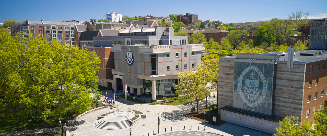 Bird's-eye view of the University of Scranton campus, featuring St. Thomas Hall, the Weinberg Memorial Library, and the flag commons.