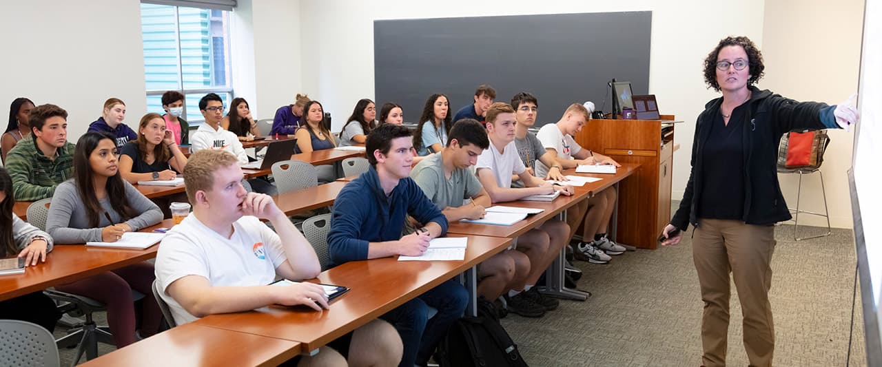 Biology class being lectured by professor