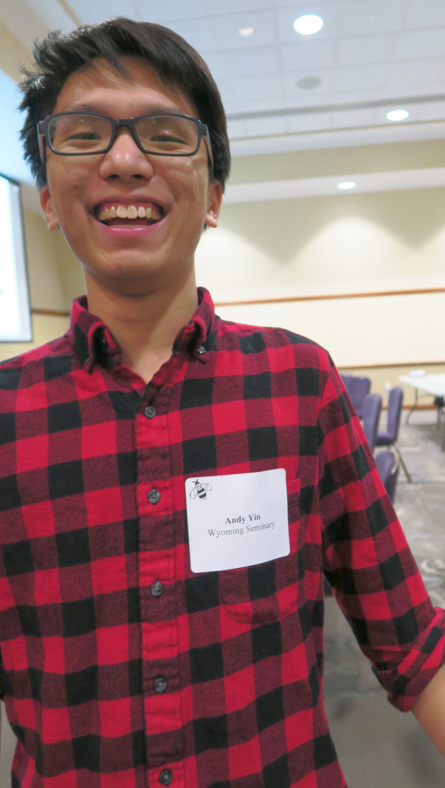 A closeup of a smiling Wyoming Seminary male student during the 2019 Integration Bee