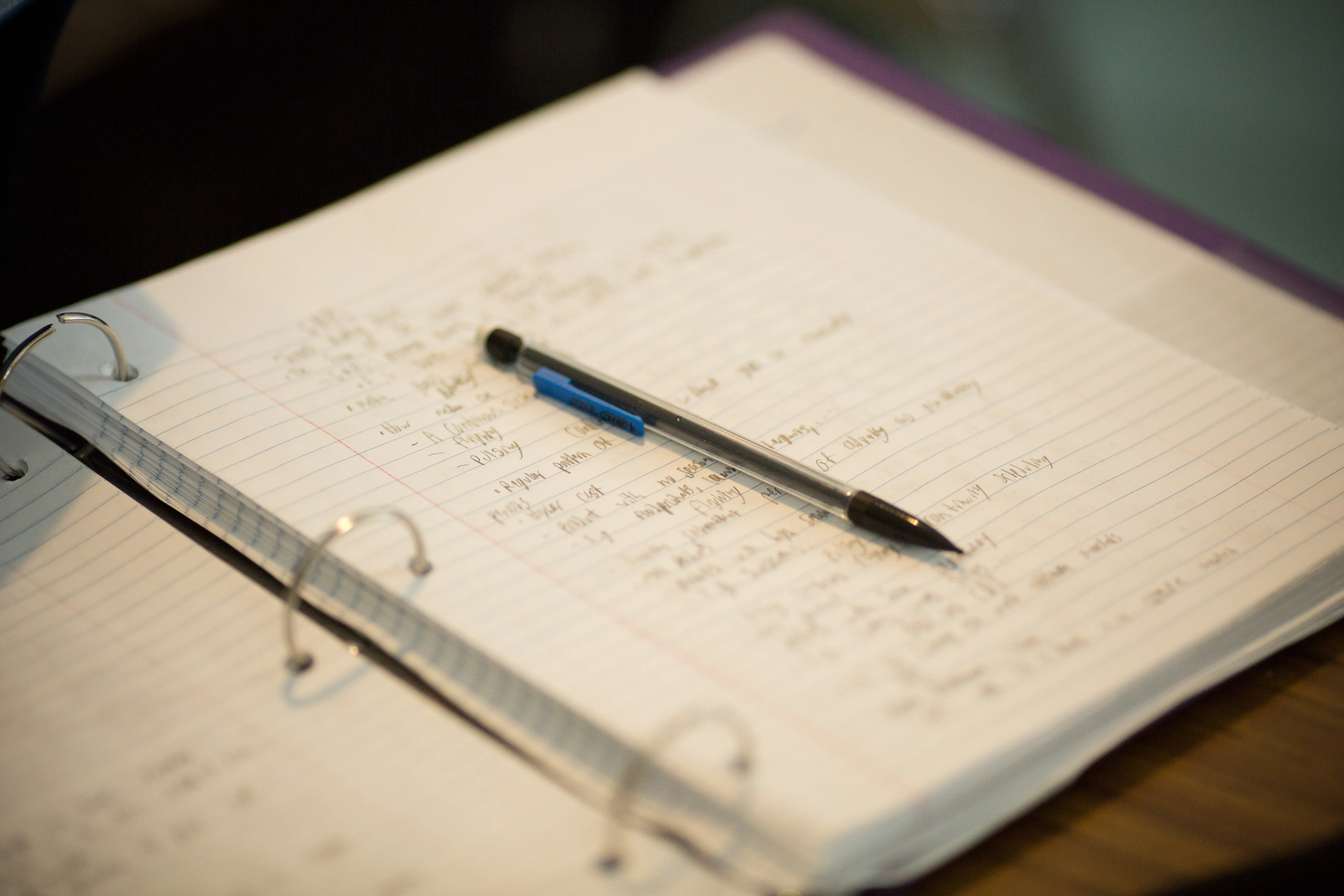 notebook with pencil