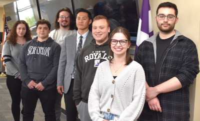 Six University of Scranton students (two females and four males) with Assistant Professor Sinchul Back. The students won first and second place in a national Cyber Forensic Student Competition. 