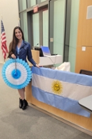 Magali holding an Argentinian rosette