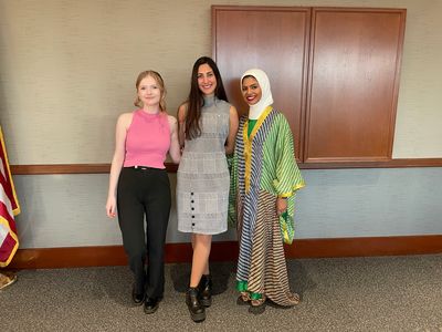 French FLTA Audrey, Spanish FLTA Magali, and Arabic FLTA Badoor standing alongside eachother