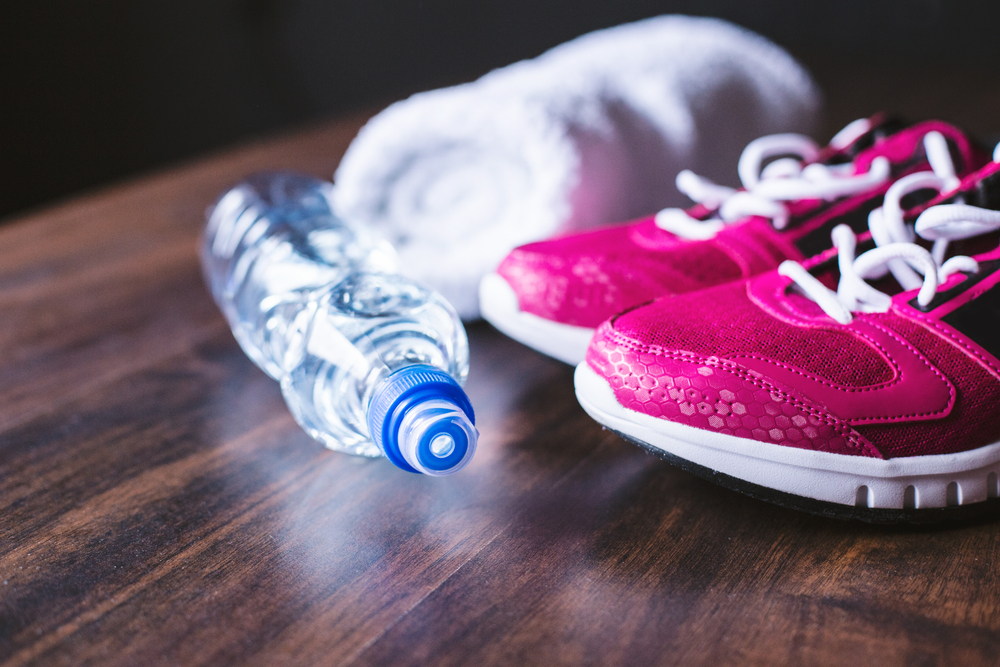 image of pink sneakers and water bottle